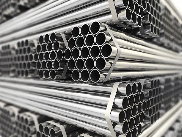 Bundles of galvanised iron pipes in stock